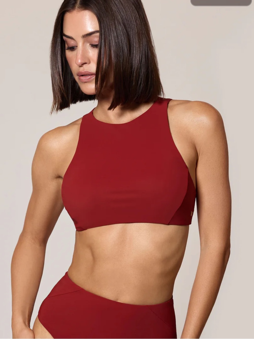 Athletic Halter Bikini Top. Size small. Color: Burned red. NWOT